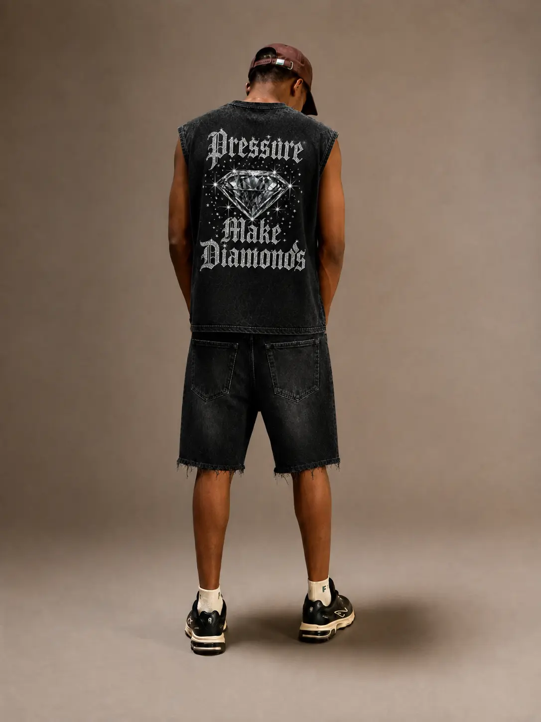 Top sin mangas acid wash con parche bordado